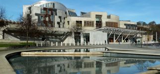 Scottish_Parliament_Building_and_adjacent_water_pool,_2017.jpg
